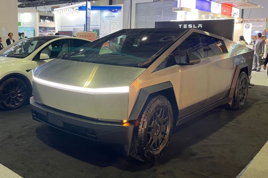 Tesla Cybertruck on display at ITS World Congress 2024 in Dubai, highlighting its futuristic design and advanced electric vehicle technology.